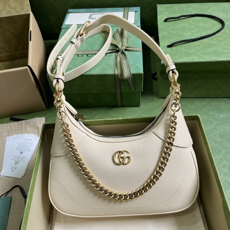 G*u*i top handle bags
